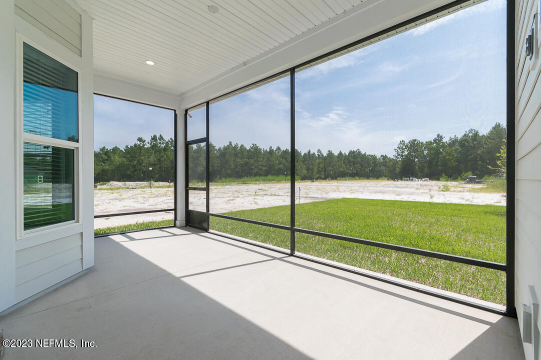 526 Eagle Moon Lake Drive St. Augustine, FL 32092 - Photo 22 of 24 a view of an outdoor space with a balcony