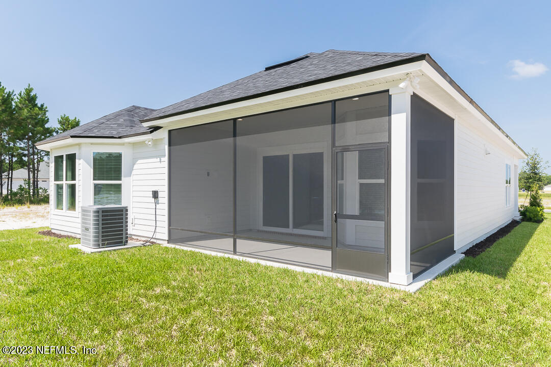 526 Eagle Moon Lake Drive St. Augustine, FL 32092 - Photo 23 of 24 a front view of house with yard