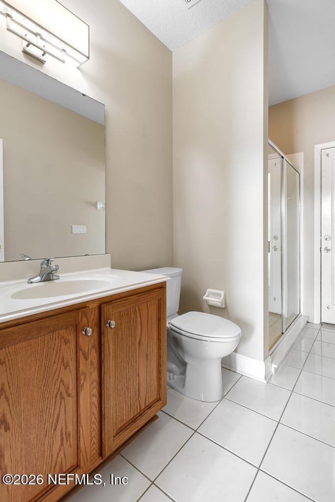 337 South Mill View Way Ponte Vedra Beach, FL 32082 - Photo 27 of 55 a bathroom with a sink a toilet and a mirror