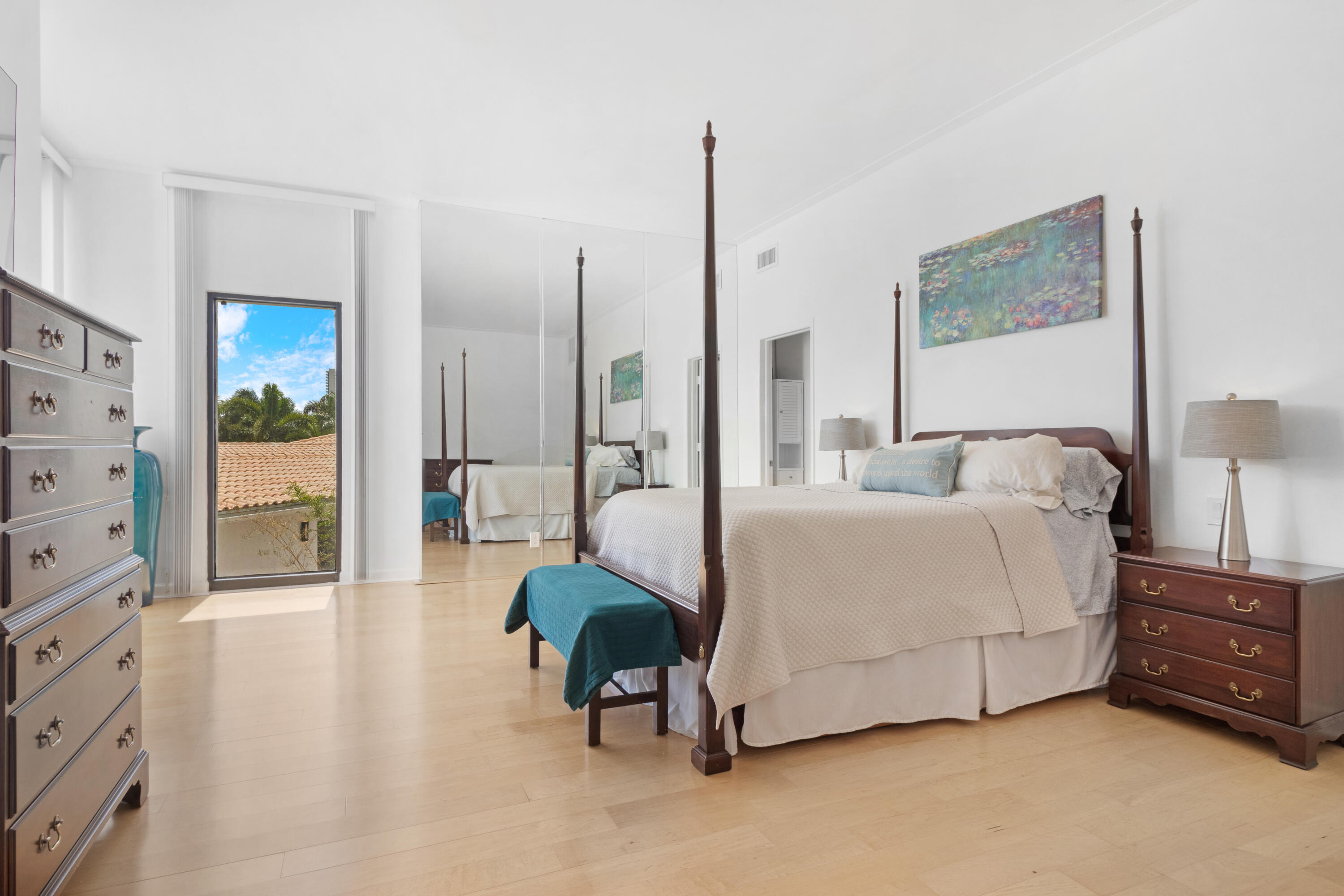 2549 Southeast 9th Street Pompano Beach, FL 33062 - Photo 24 of 73 a spacious bedroom with a bed window and a table