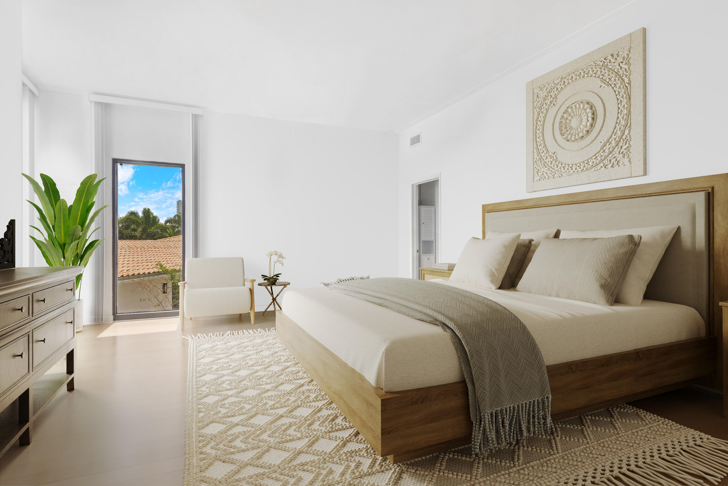 2549 Southeast 9th Street Pompano Beach, FL 33062 - Photo 25 of 73 a bedroom with bed and a potted plant