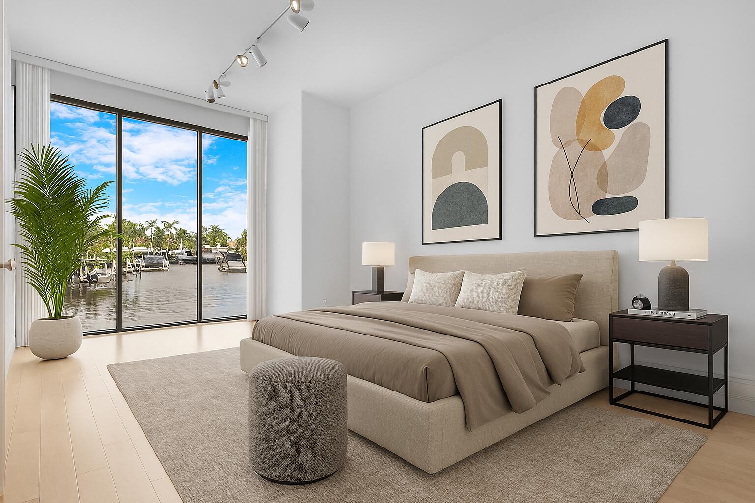 2549 Southeast 9th Street Pompano Beach, FL 33062 - Photo 34 of 73 a bedroom with a large bed and a large window