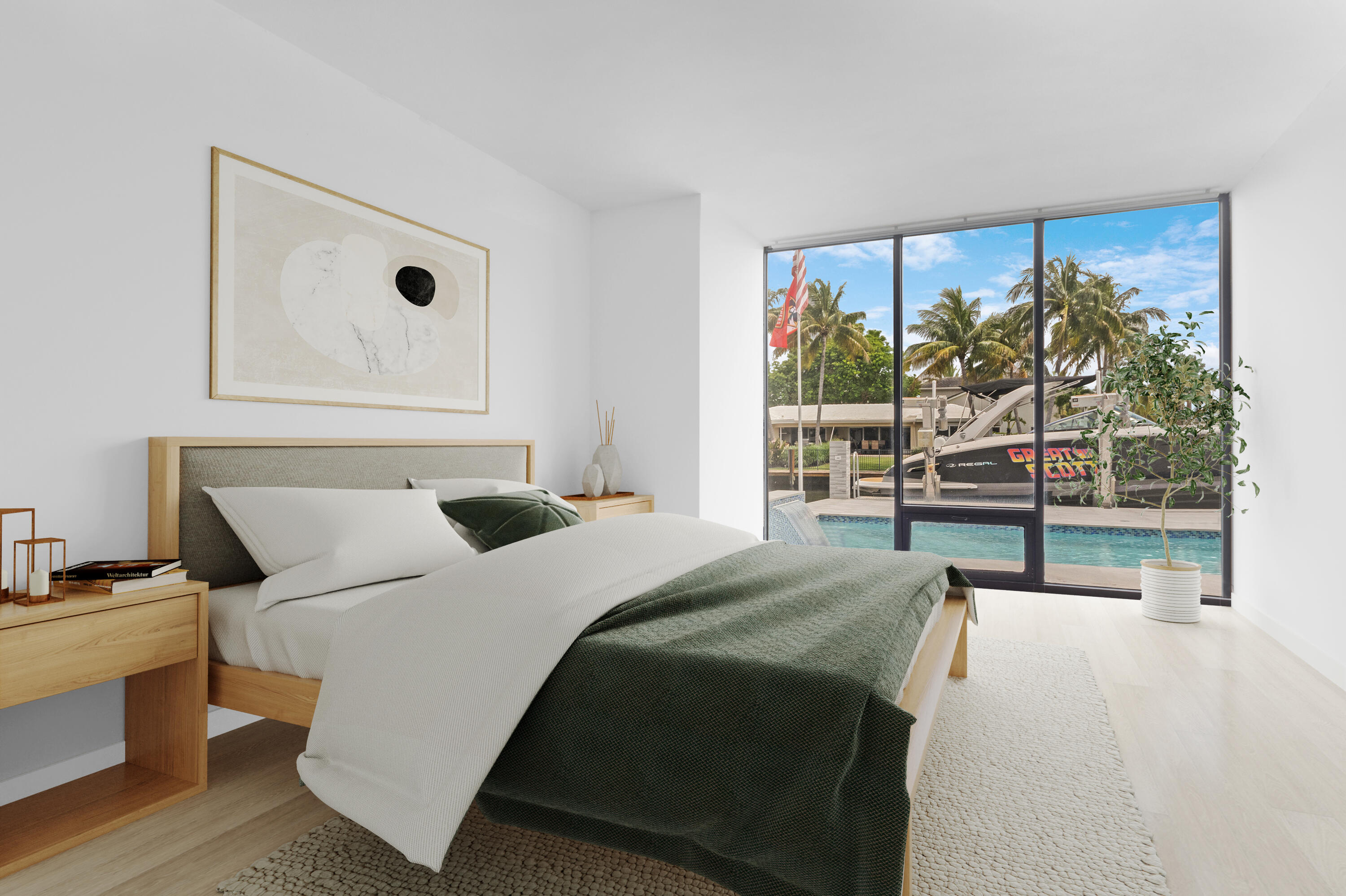 2549 Southeast 9th Street Pompano Beach, FL 33062 - Photo 42 of 73 a bedroom with a large bed and a flat tv screen on dresser