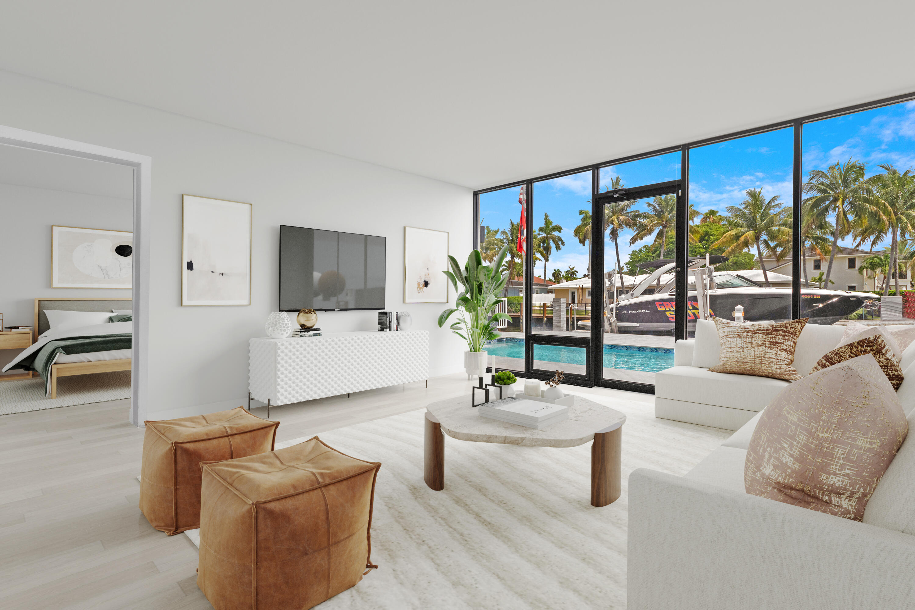 2549 Southeast 9th Street Pompano Beach, FL 33062 - Photo 44 of 73 a living room with furniture and a flat screen tv