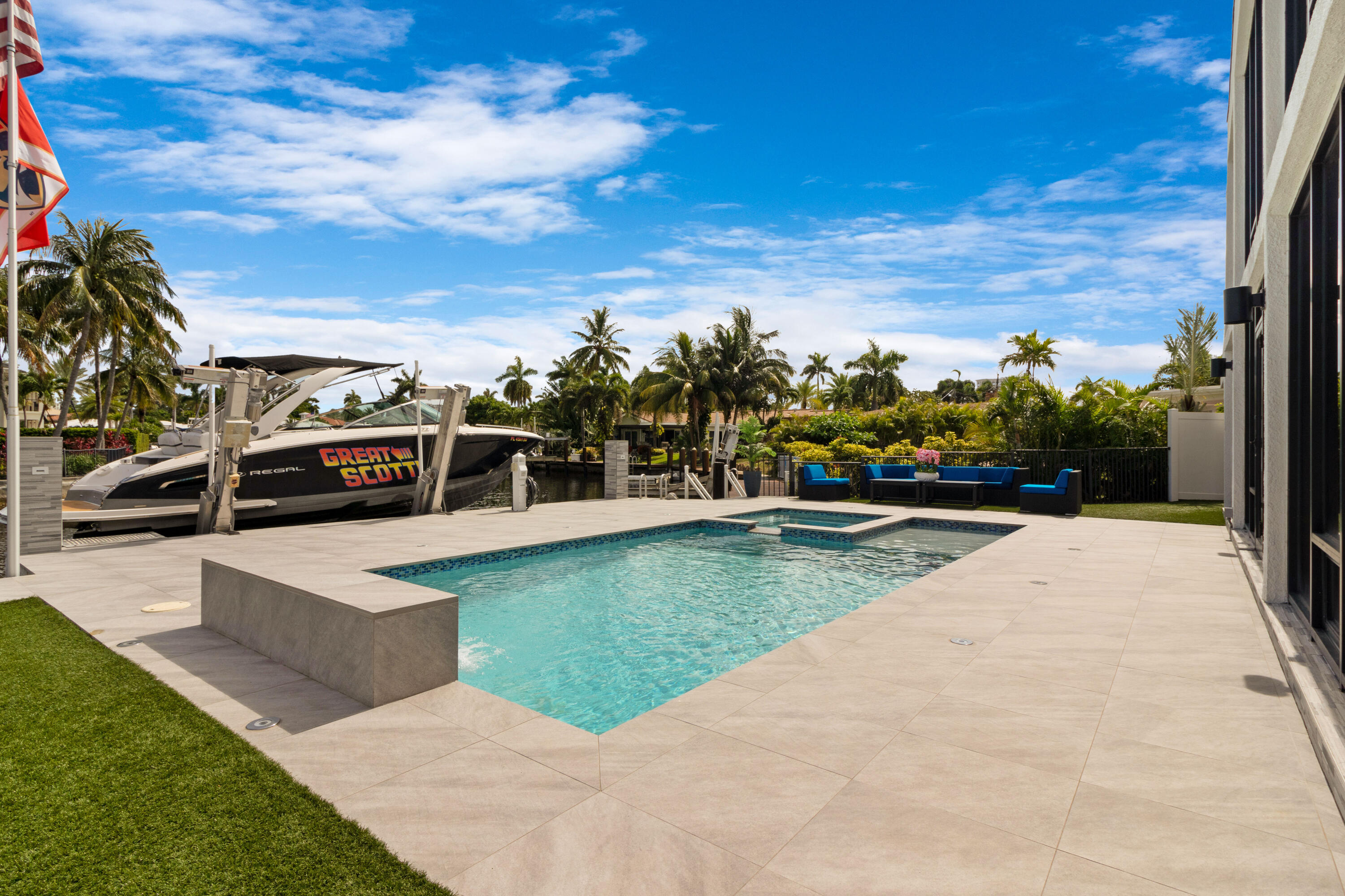 2549 Southeast 9th Street Pompano Beach, FL 33062 - Photo 50 of 73 a view of a swimming pool with an outdoor seating