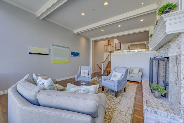 9699 Bypass Road, Unit 5 Alta, UT 84092 - Photo 16 of 54 Spacious living area featuring high ceilings with exposed beams, recessed lighting, and wood-finish flooring