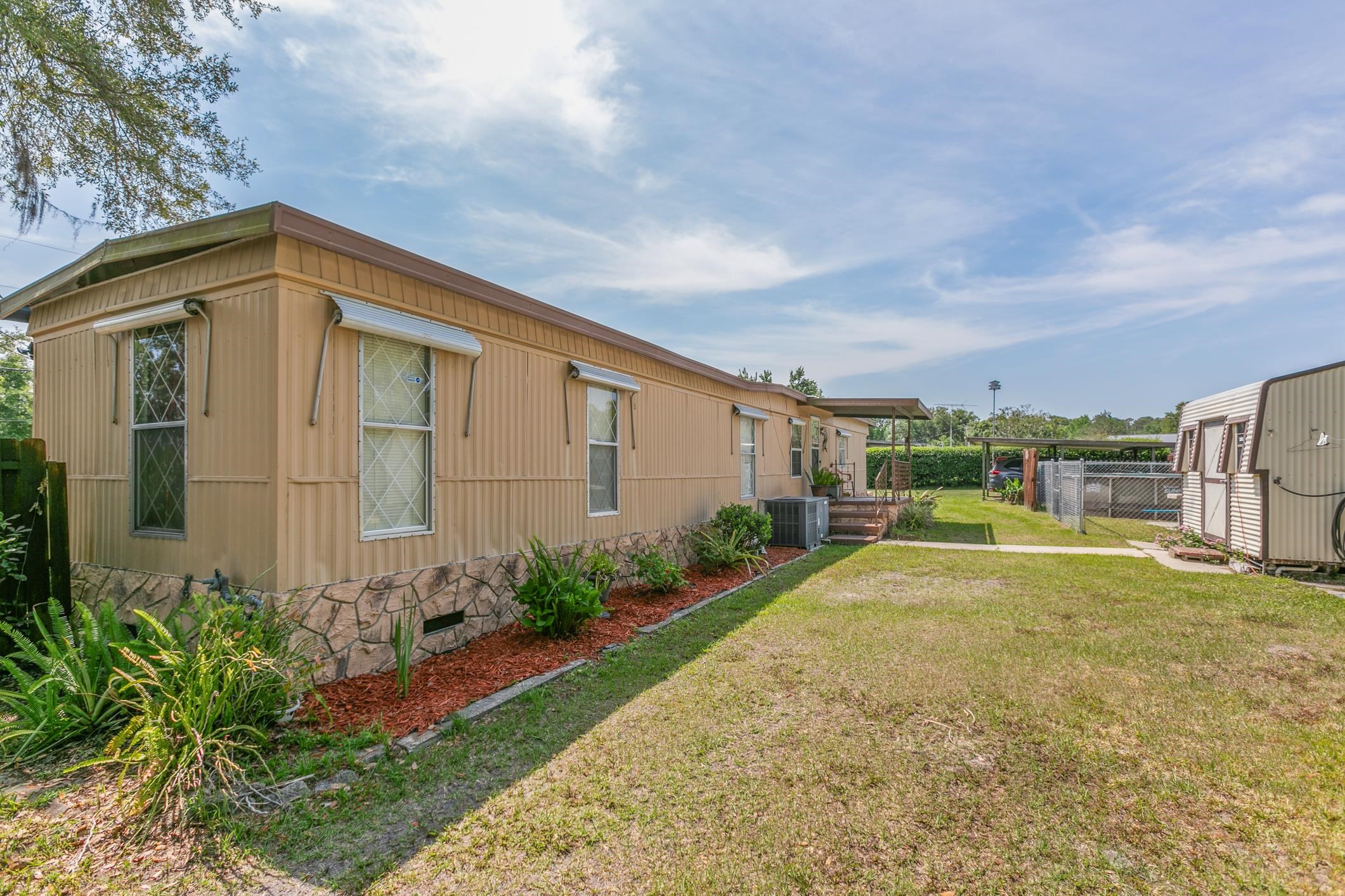 227 Spec Lane Crescent City, FL 32112 - Photo 19 of 24 a view of backyard of the house