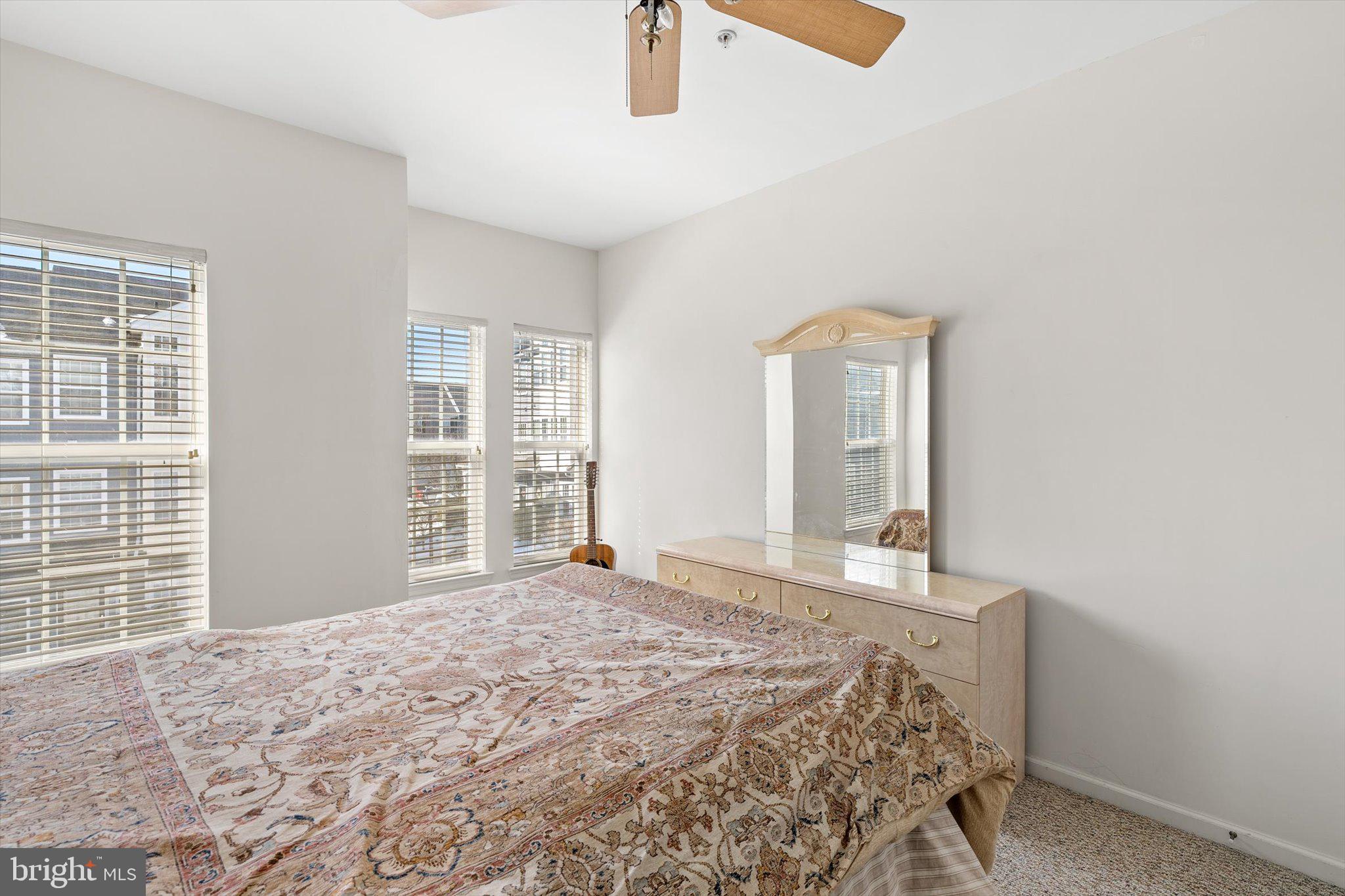 13 River Lane Delanco, NJ 08075 - Photo 14 of 19 a bedroom with a bed and a window