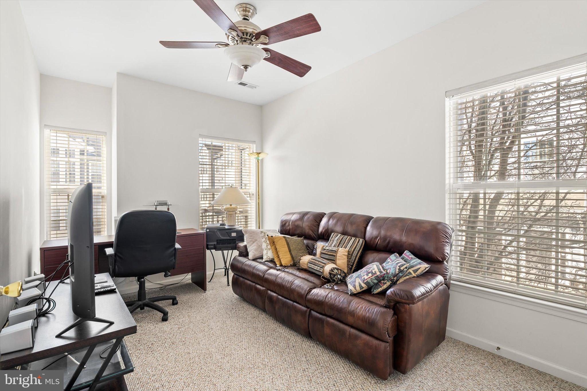 13 River Lane Delanco, NJ 08075 - Photo 17 of 19 a living room with furniture and a window