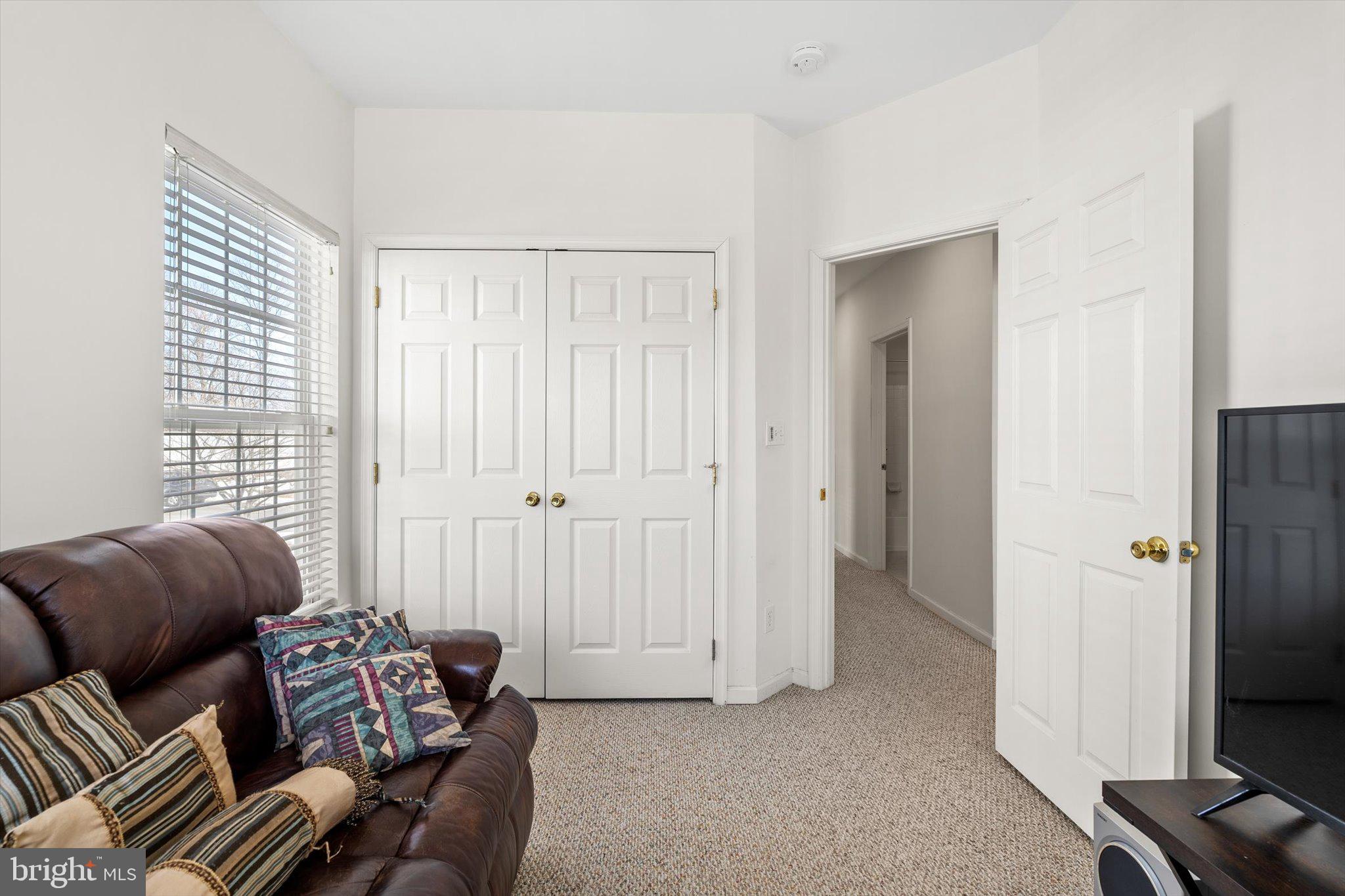 13 River Lane Delanco, NJ 08075 - Photo 19 of 19 a living room with furniture and a flat screen tv