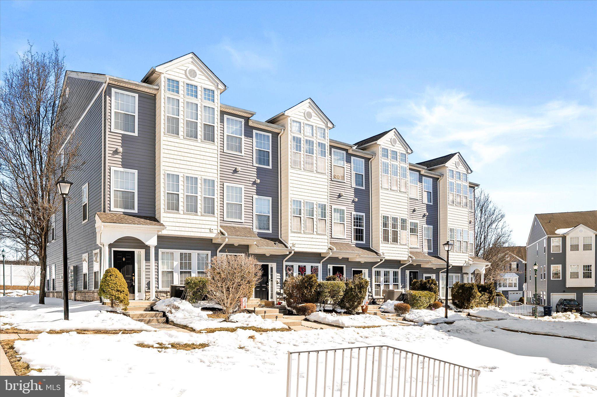13 River Lane Delanco, NJ 08075 - Photo 2 of 19 a view of city with tall buildings