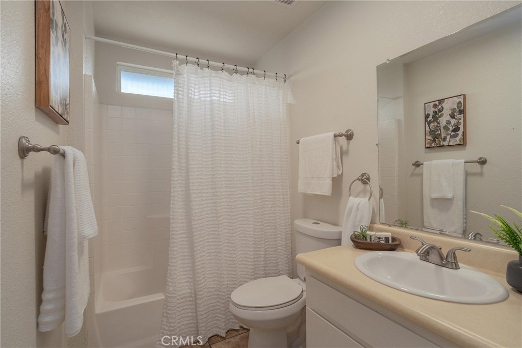 346 Stanton Way Orland, CA 95963 - Photo 20 of 41 a bathroom with a sink toilet and shower