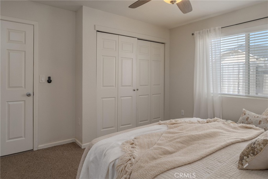 346 Stanton Way Orland, CA 95963 - Photo 25 of 41 a bedroom with a bed and a window