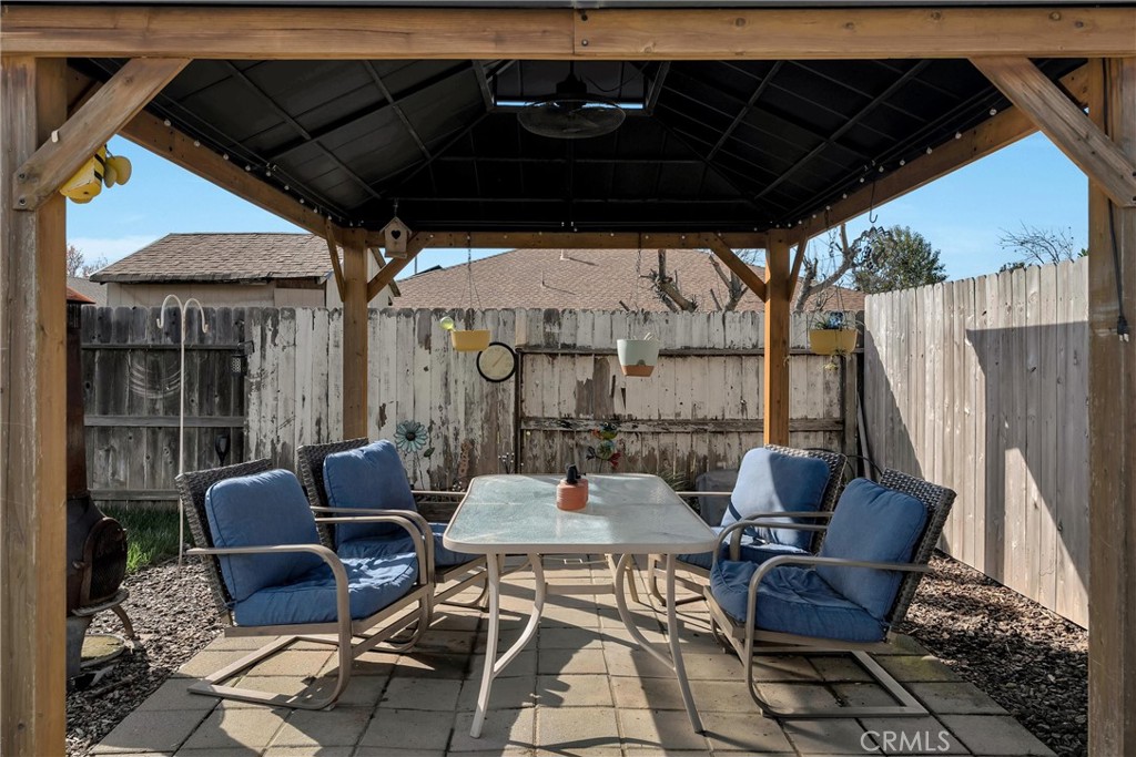 346 Stanton Way Orland, CA 95963 - Photo 35 of 41 a outdoor space with patio the couches and a potted plant
