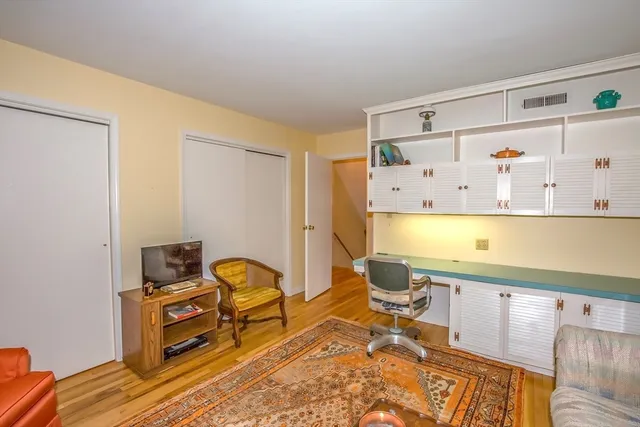 a living room with furniture and a table