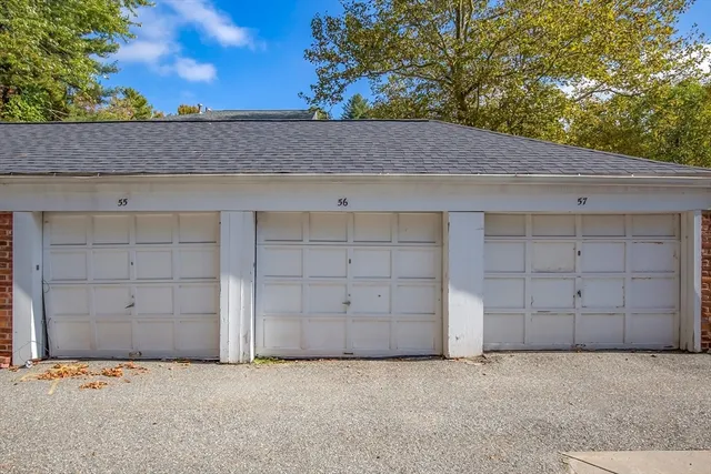 an empty room with a wooden door