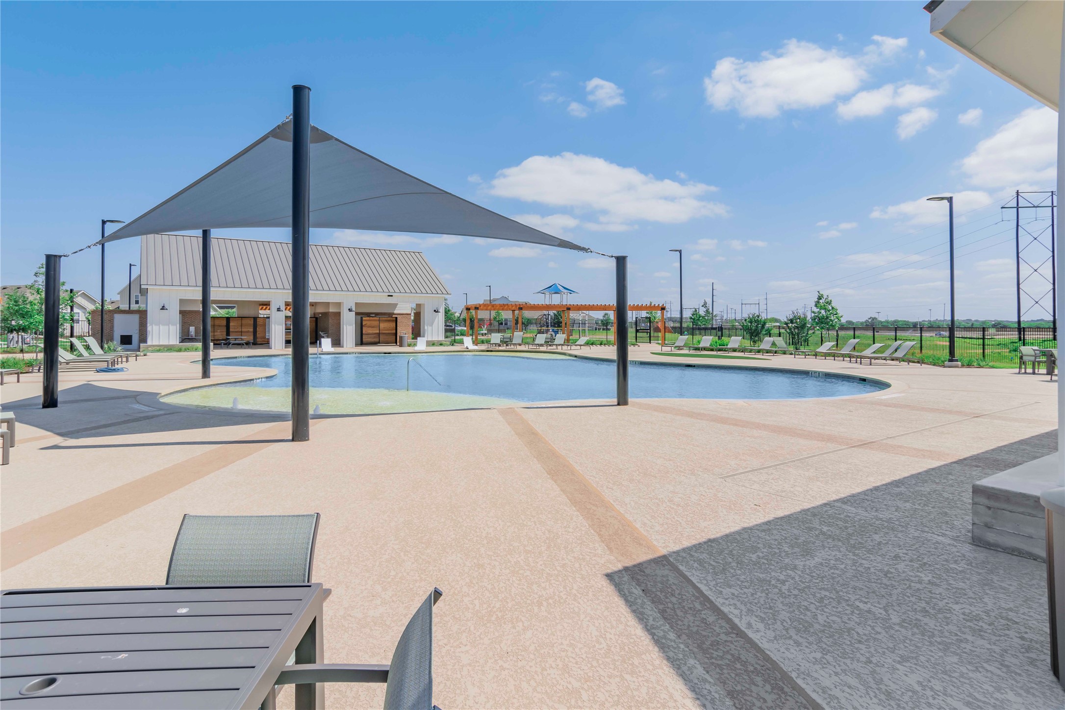 1257 Goforth Road Kyle, TX 78640 - Photo 26 of 33 Community pool with a patio area