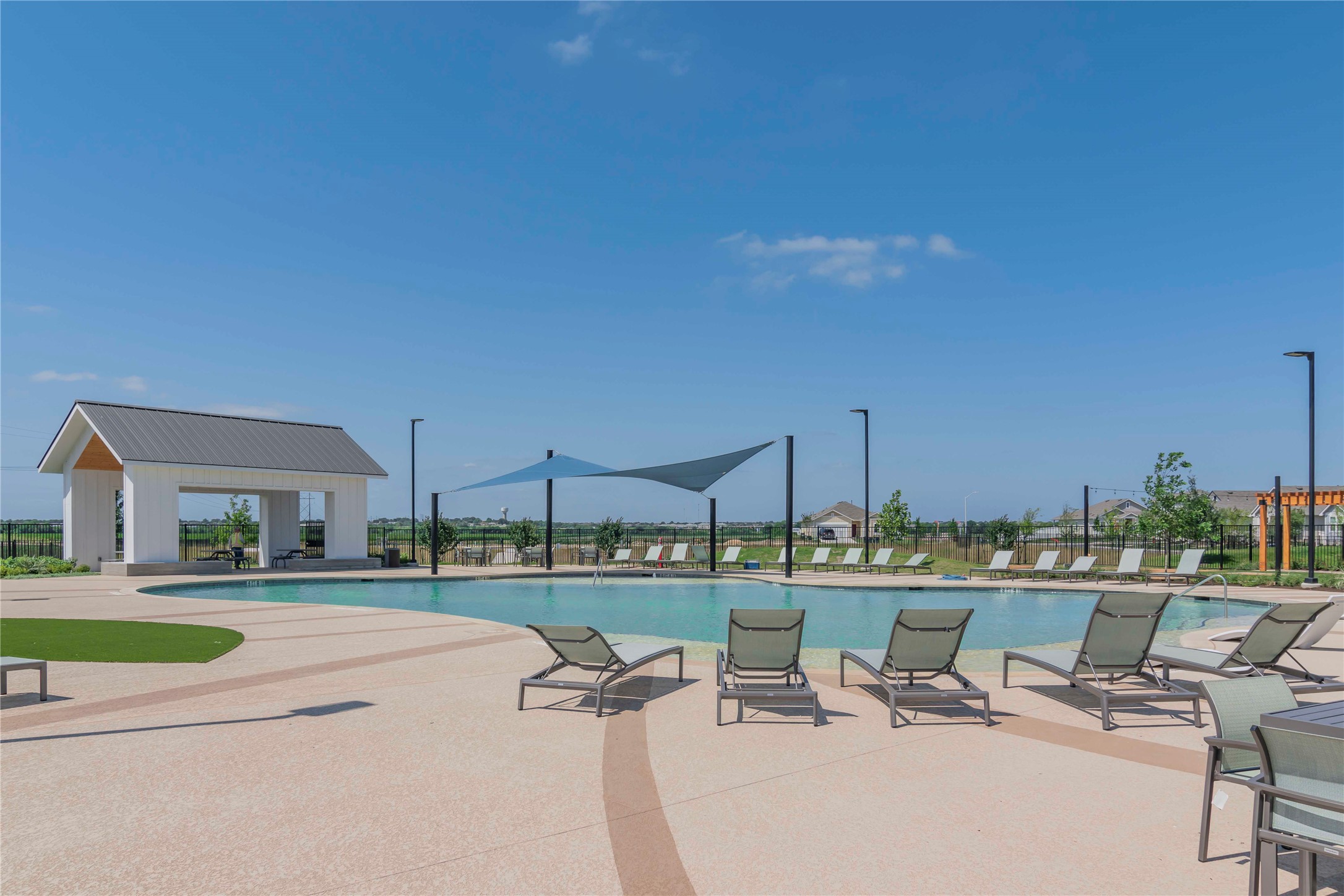 1257 Goforth Road Kyle, TX 78640 - Photo 28 of 33 Community pool featuring a patio area