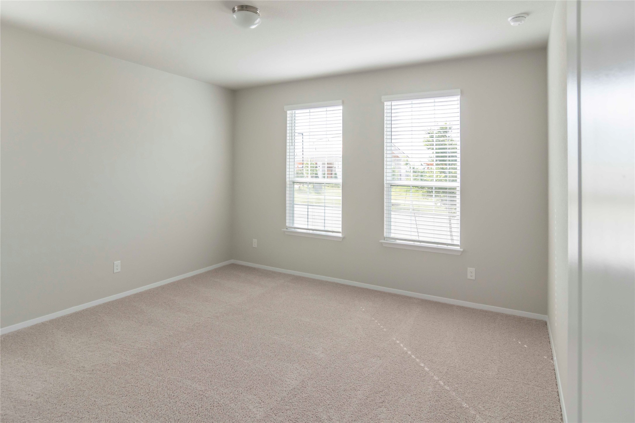 1257 Goforth Road Kyle, TX 78640 - Photo 8 of 33 Unfurnished room featuring carpet floors and baseboards