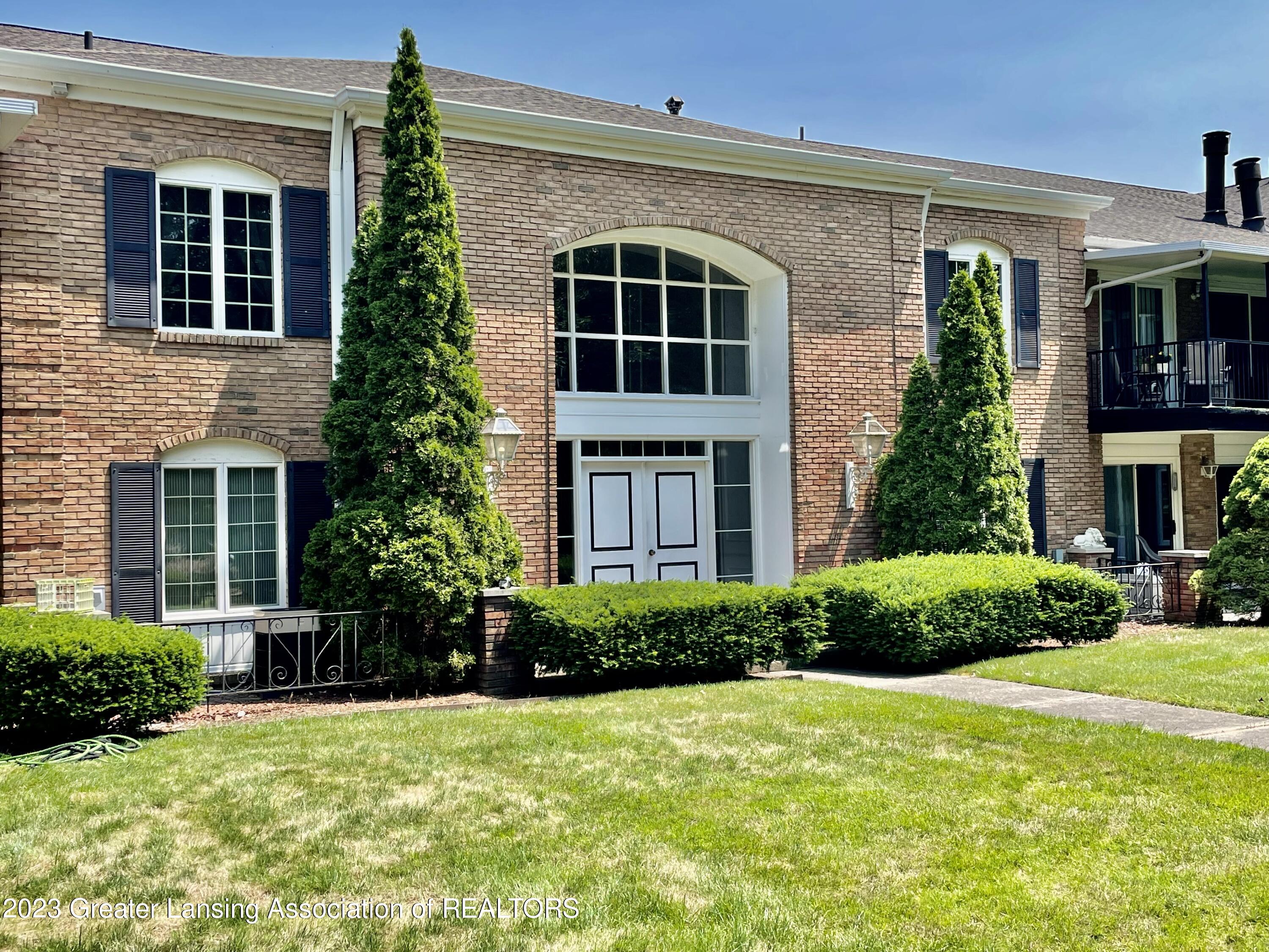 1740 Wellington Road, Unit 112 Lansing, MI 48910 - Photo 27 of 28 Back of the Building