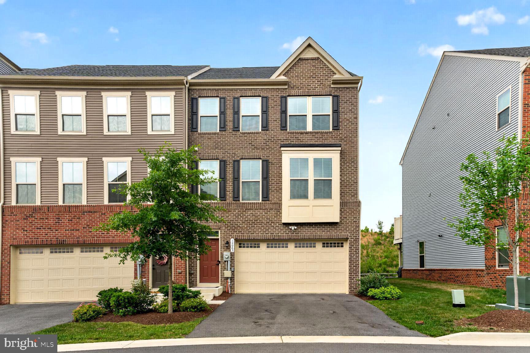 GORGEOUS 4-LEVEL MCPHERSON END UNIT