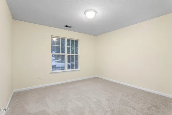 an empty room with an entryway