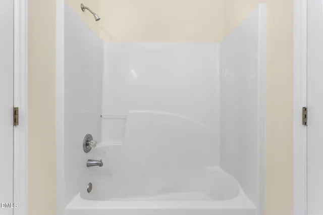 a view of a balcony with wooden floor