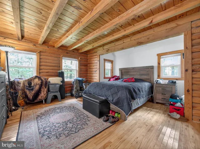 a bed room with a bed and a couch