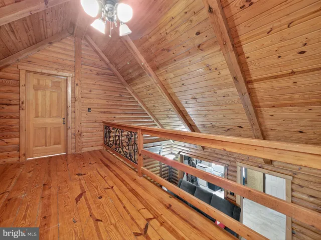 a view of balcony with wooden floor