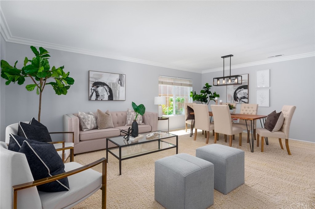 8 Elizabeth Lane Irvine, CA 92602 - Photo 41 of 41 a living room with furniture potted plant and a window