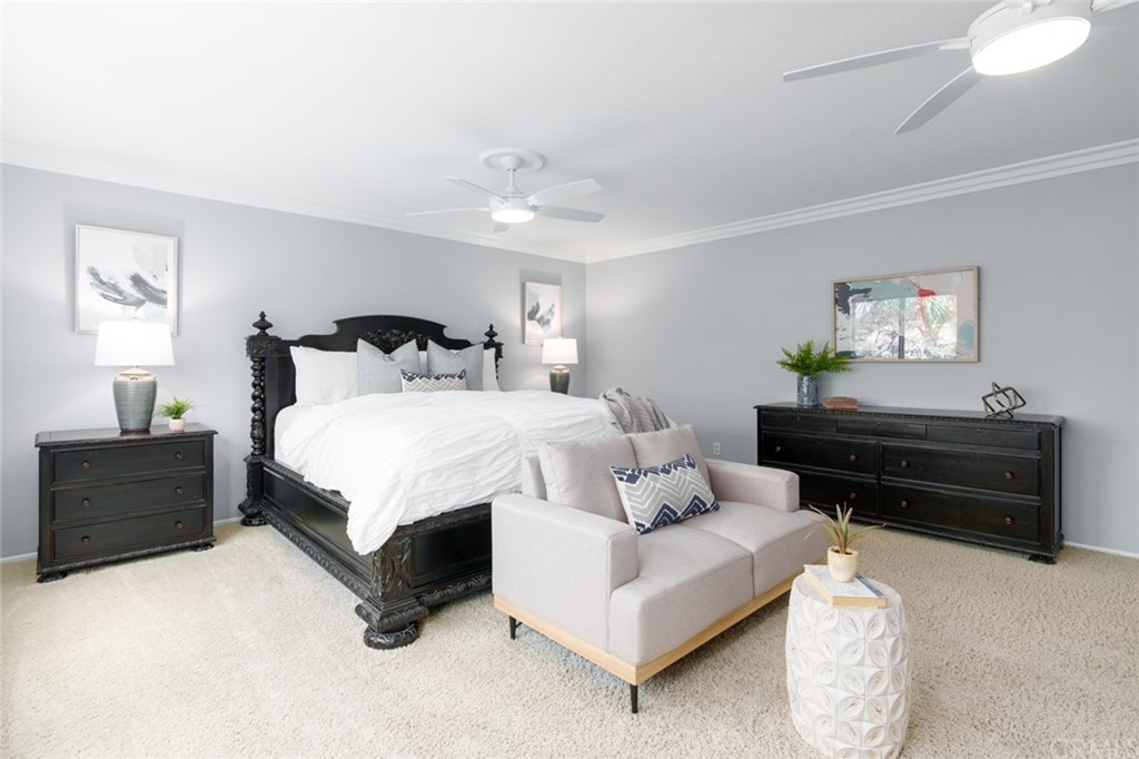 8 Elizabeth Lane Irvine, CA 92602 - Photo 20 of 41 a bedroom with bed and window