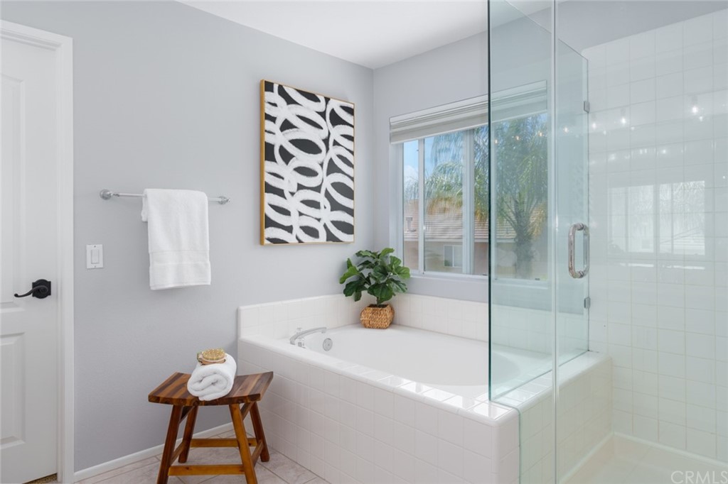 8 Elizabeth Lane Irvine, CA 92602 - Photo 23 of 41 a white bath tub sitting next to a shower