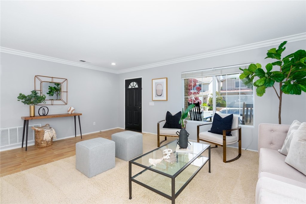 8 Elizabeth Lane Irvine, CA 92602 - Photo 2 of 41 a living room with furniture
