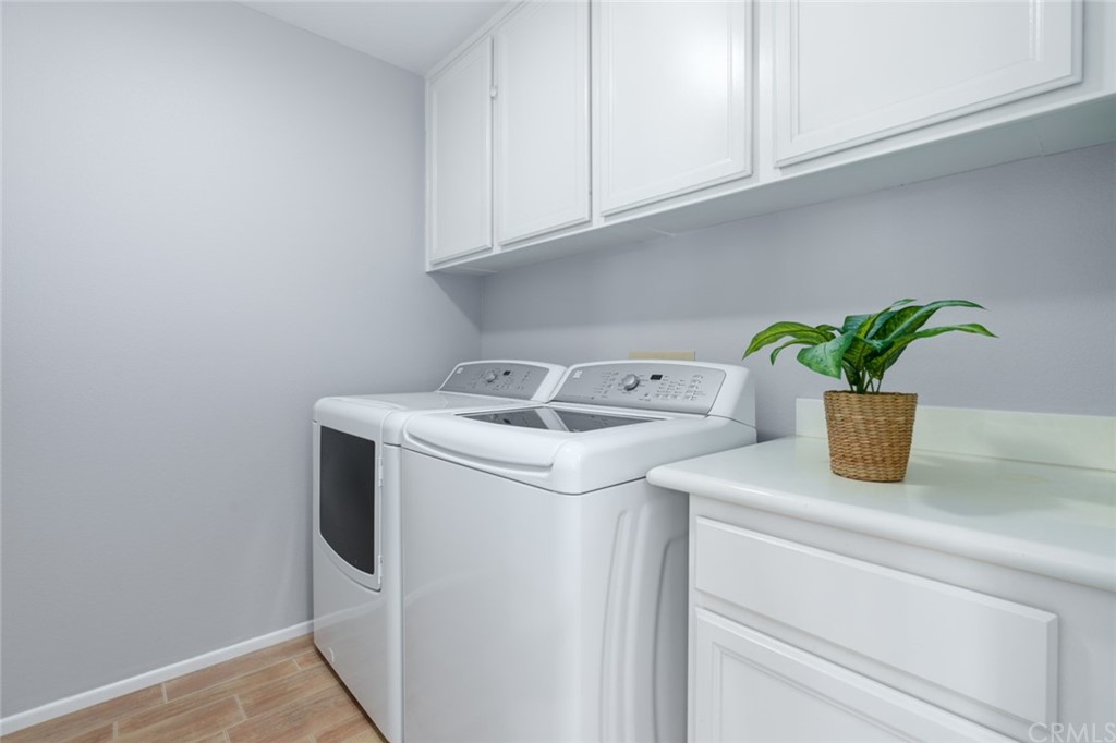 8 Elizabeth Lane Irvine, CA 92602 - Photo 30 of 41 a utility room with dryer and washer