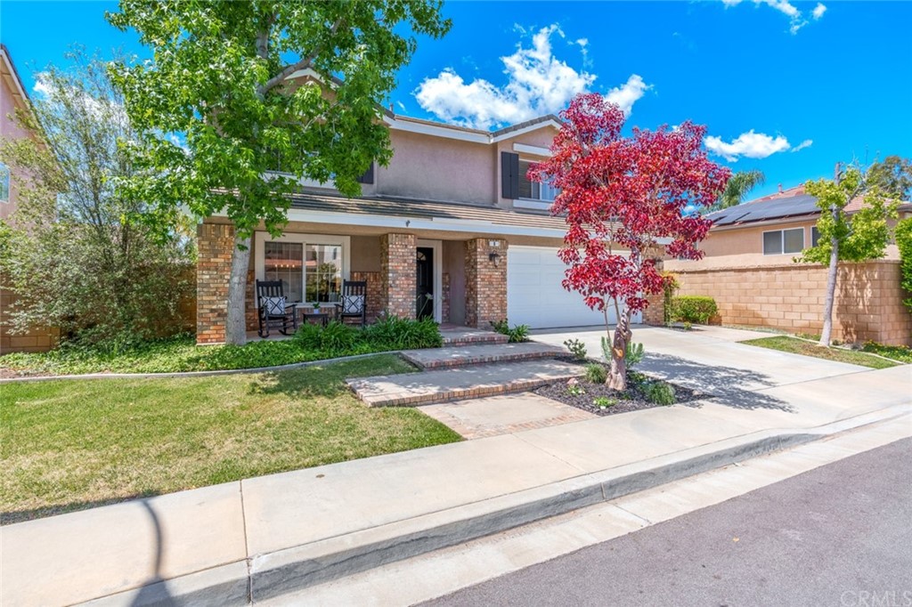 8 Elizabeth Lane Irvine, CA 92602 - Photo 35 of 41 a front view of a house with yard