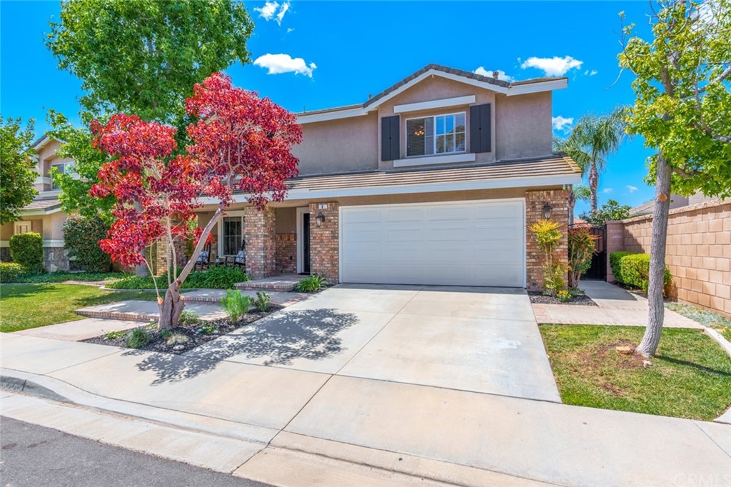8 Elizabeth Lane Irvine, CA 92602 - Photo 36 of 41 a front view of a house with garden