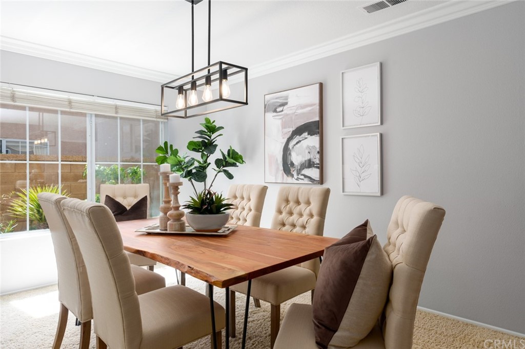 8 Elizabeth Lane Irvine, CA 92602 - Photo 4 of 41 a view of a dining room with furniture window and outside view