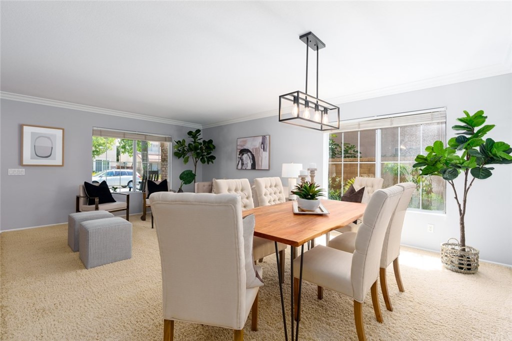 8 Elizabeth Lane Irvine, CA 92602 - Photo 5 of 41 a view of a dining room with furniture window and wooden floor