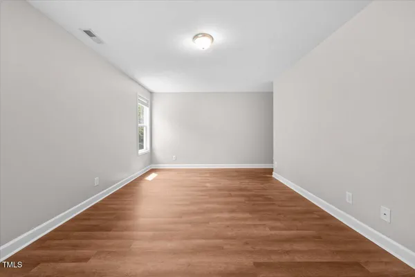 an empty room with window