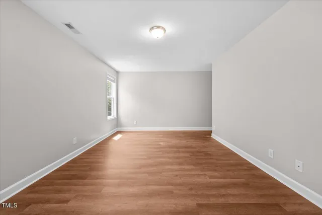 an empty room with window