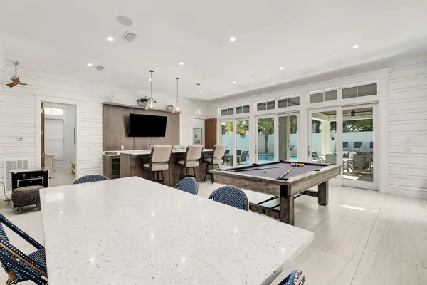 a living room with furniture fireplace and flat screen tv