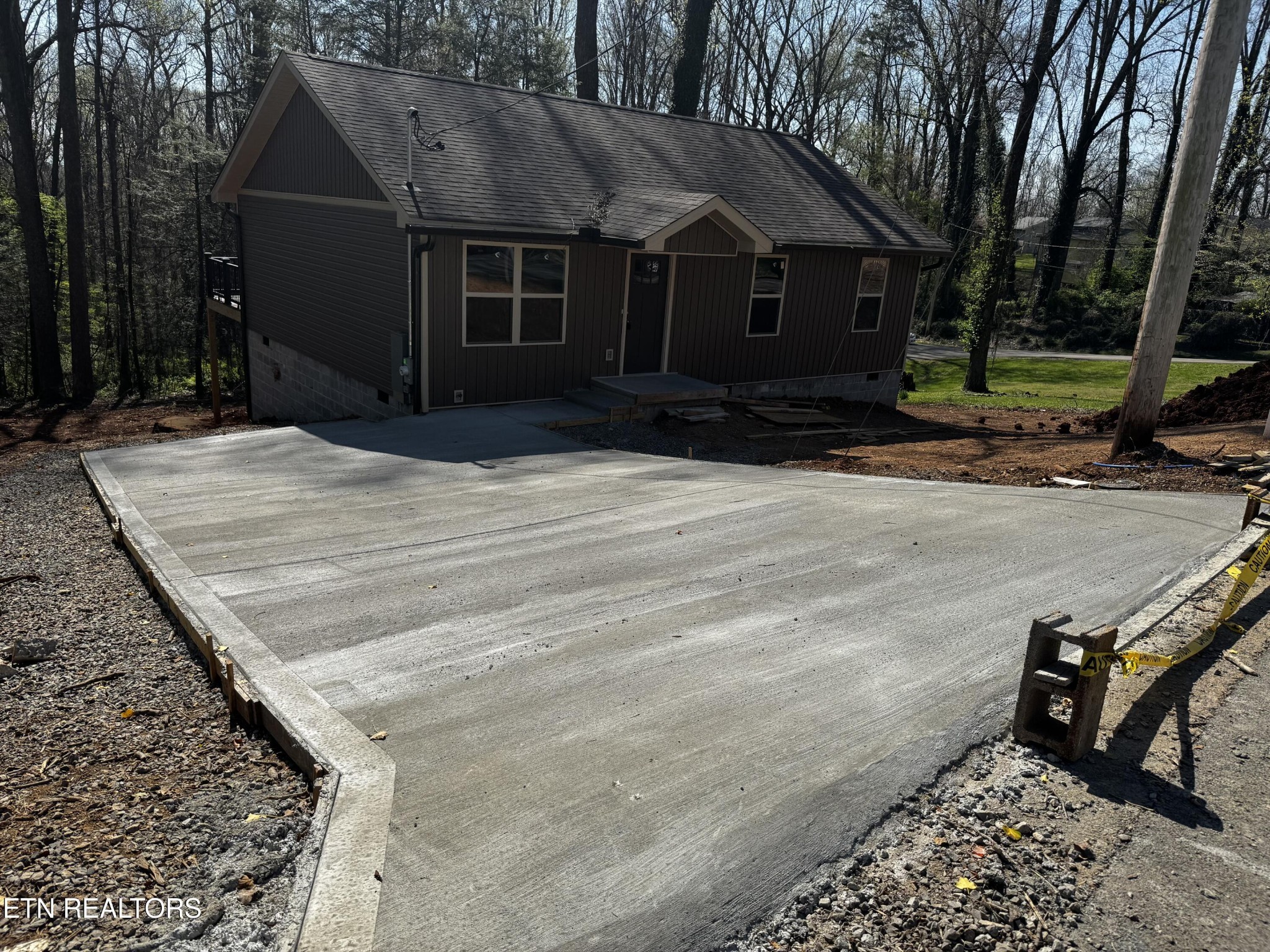 a front view of a house with yard