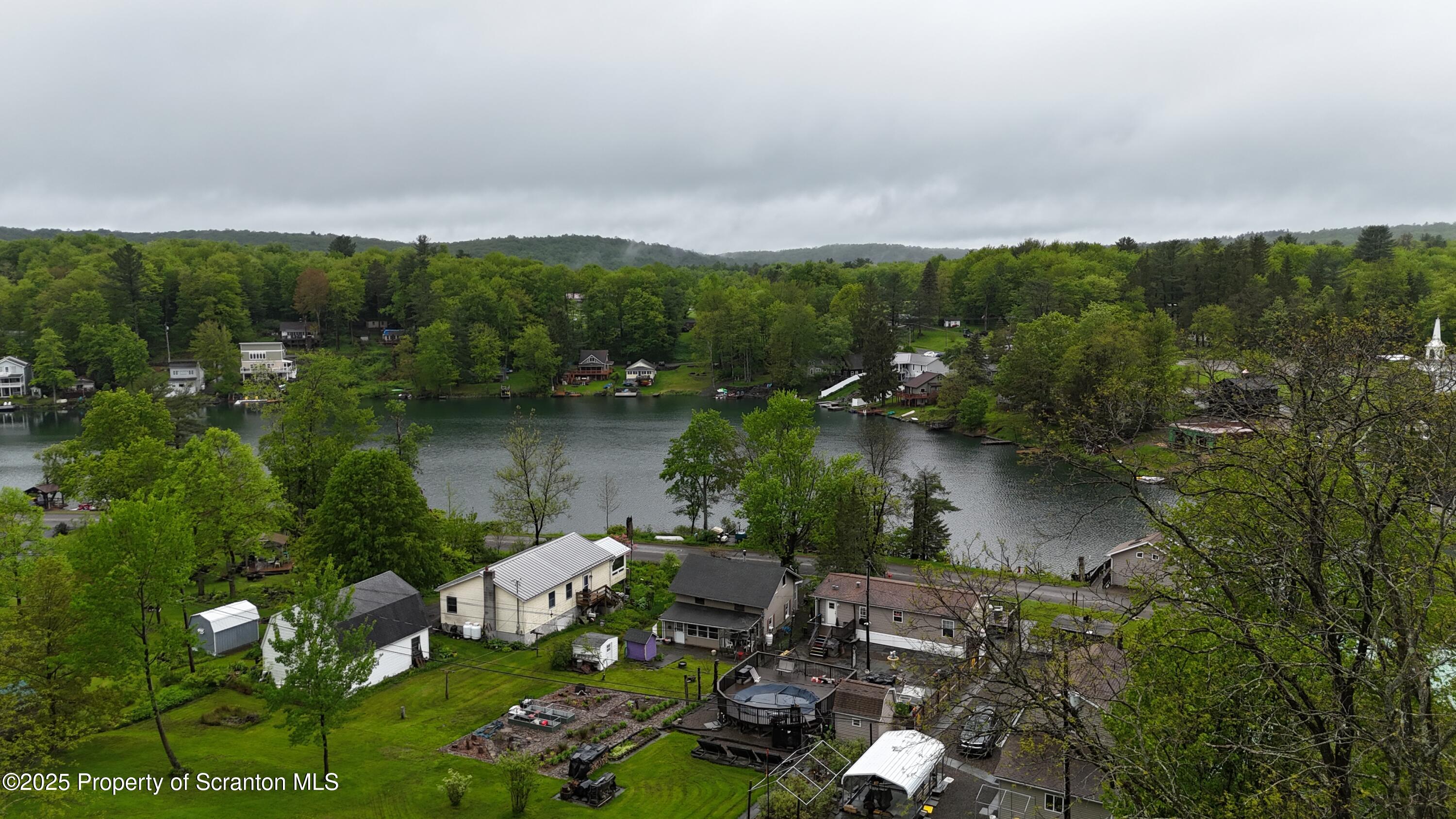 65 Reagan Road Brackney, PA 18812 - Photo 12 of 15 a view of a lake with houses