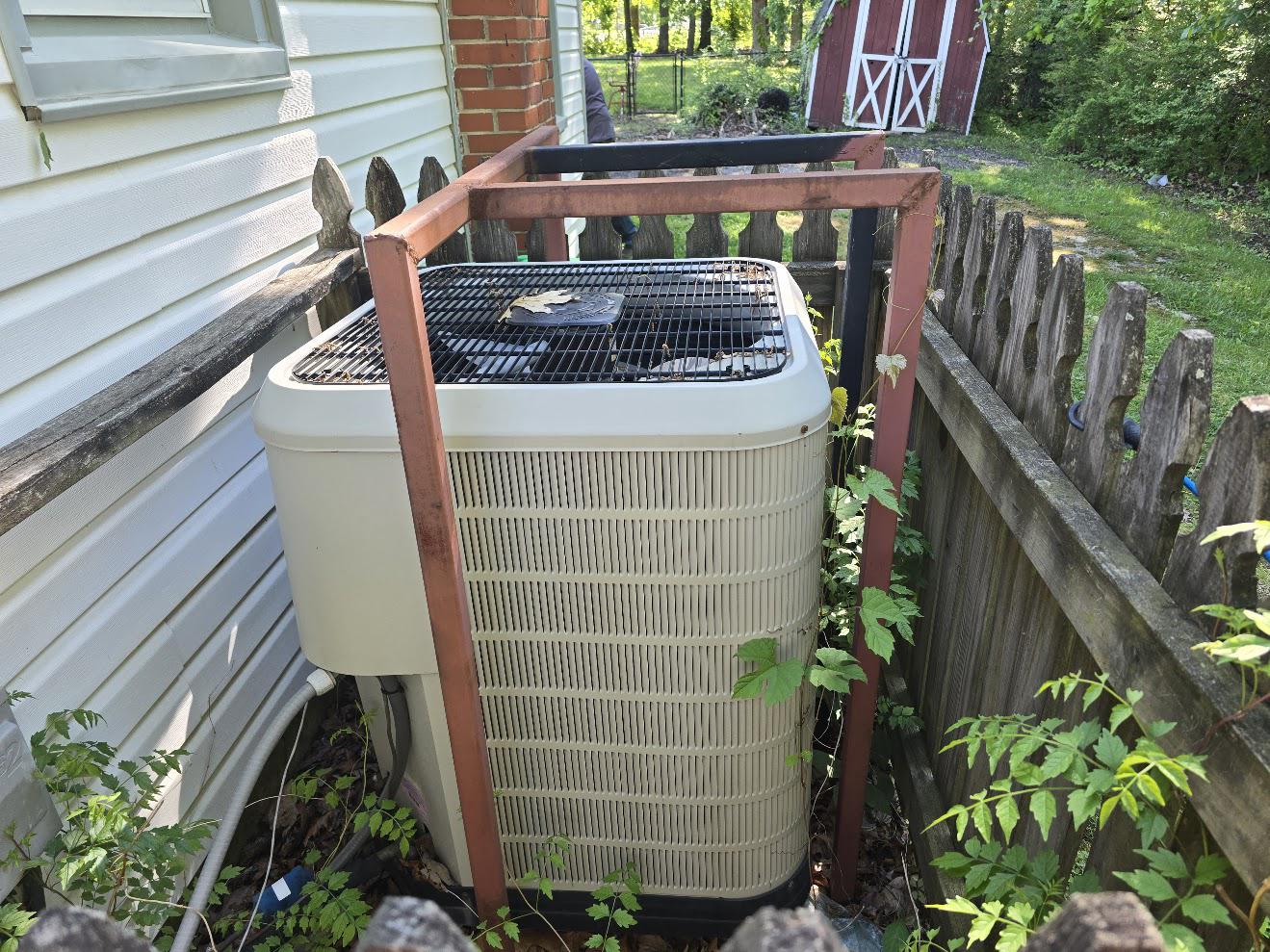 9130 D'Arcy Road Upper Marlboro, MD 20774 - Photo 14 of 38 Heat Pump blends discreetly behind fence panels.