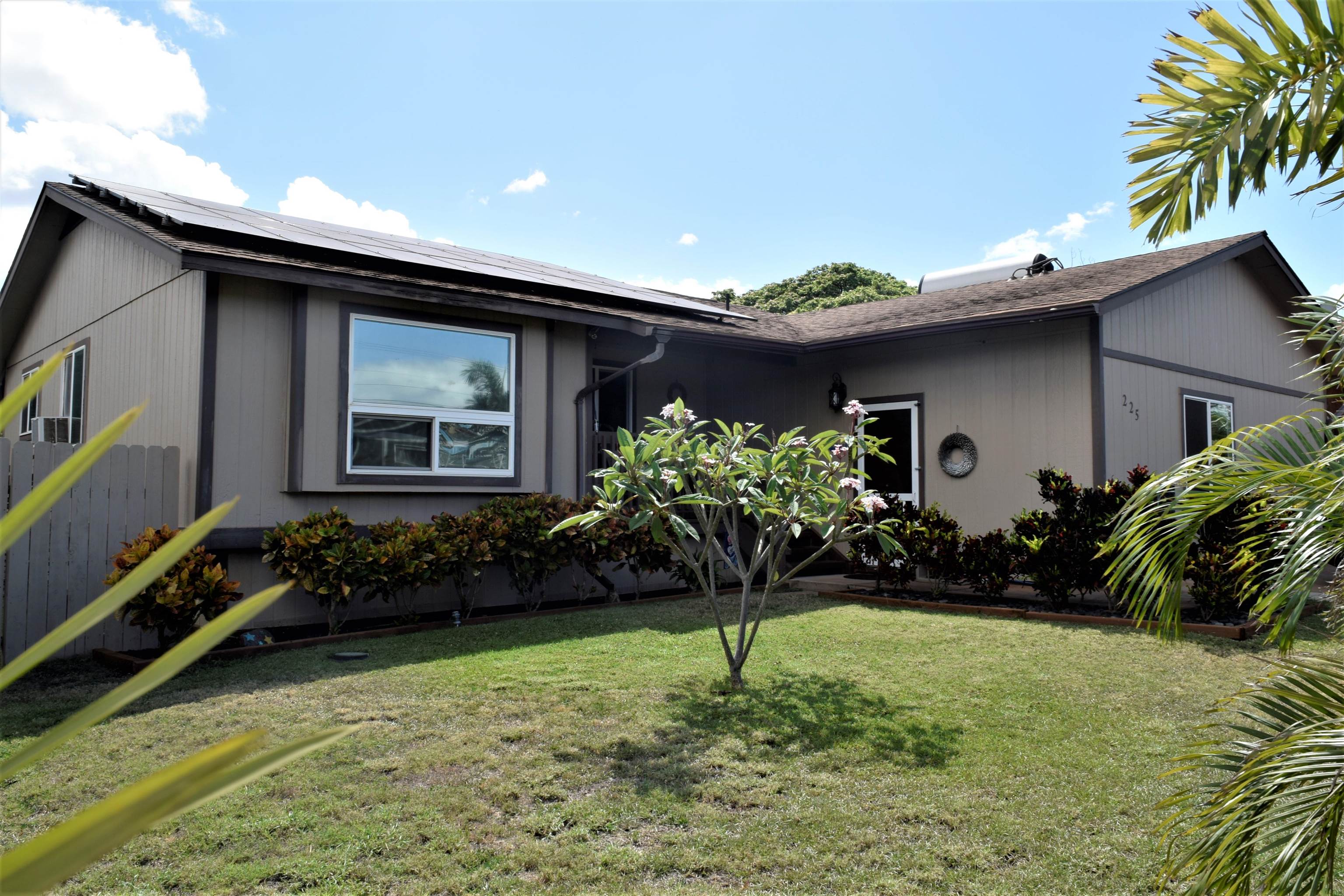 a house with trees in front of it
