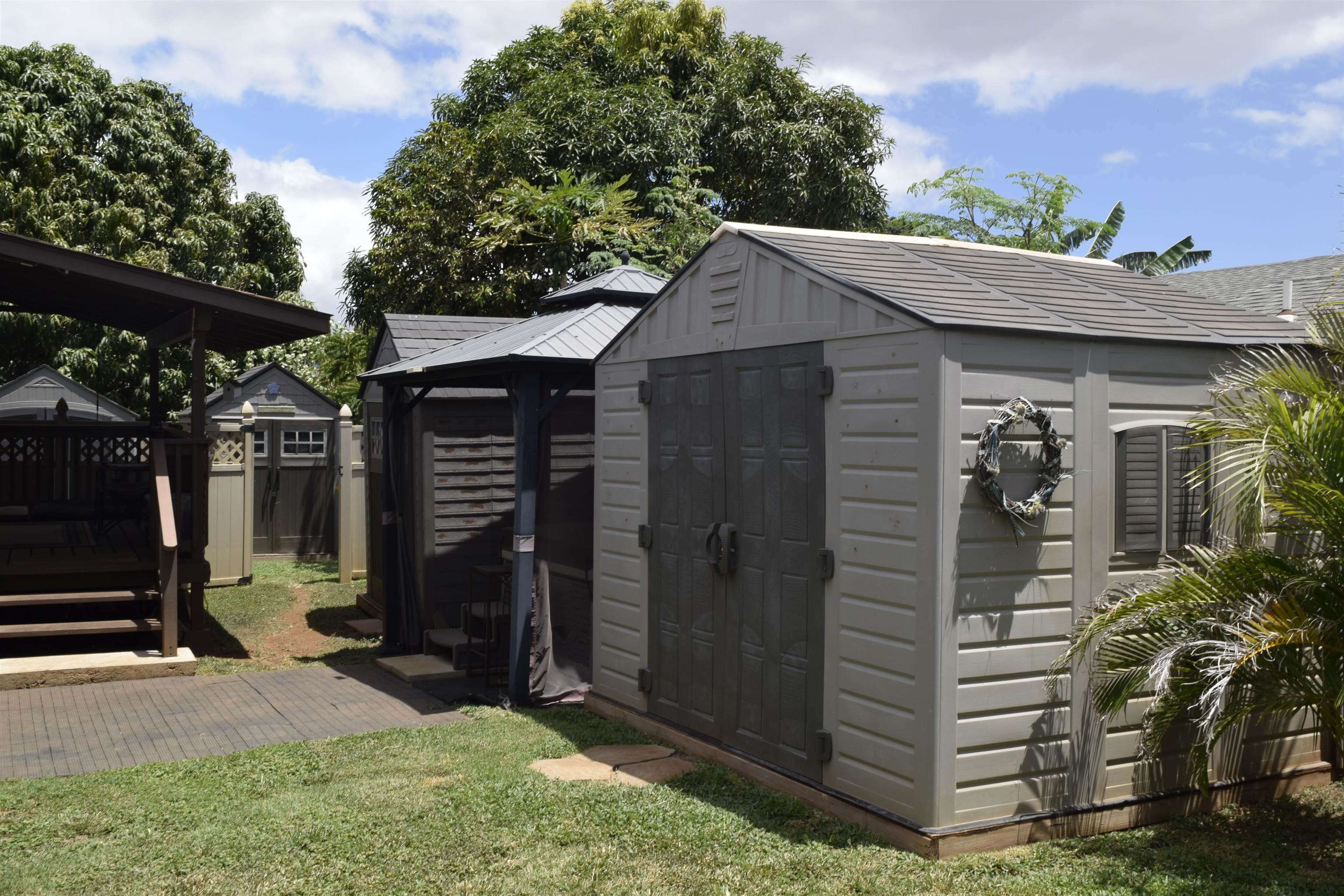 225 Humupea Street Kihei, HI 96753 - Photo 12 of 28 a view of a house with a yard