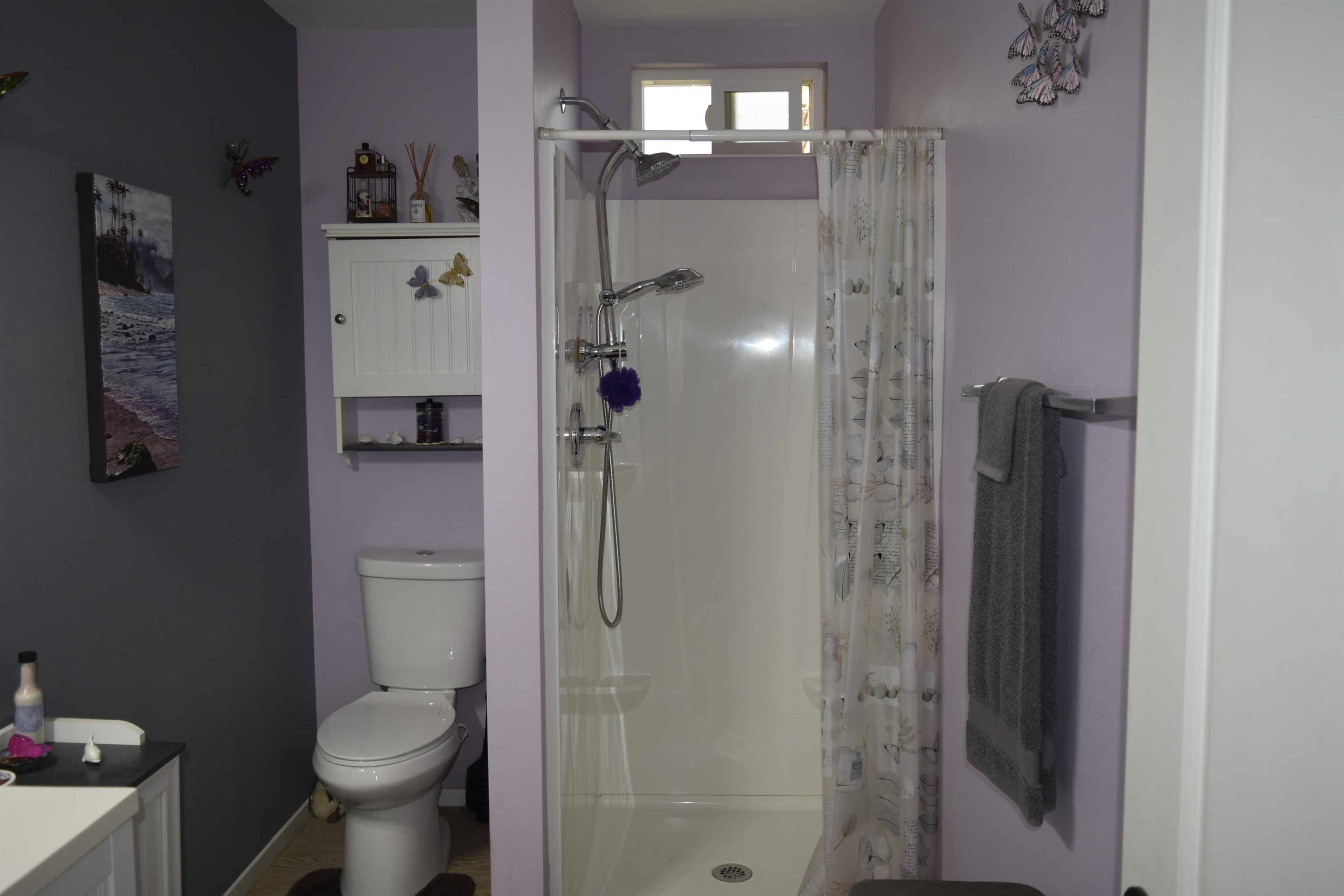 225 Humupea Street Kihei, HI 96753 - Photo 27 of 28 a bathroom with a shower and toilet