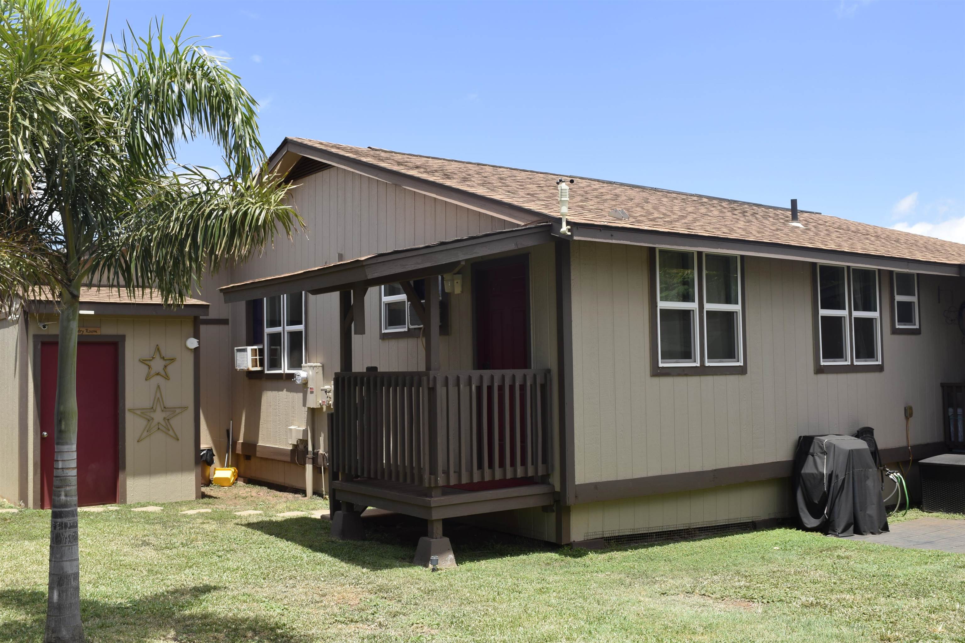 225 Humupea Street Kihei, HI 96753 - Photo 7 of 28 a front view of a house