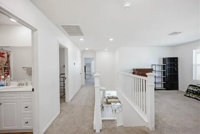 a living room with furniture and window