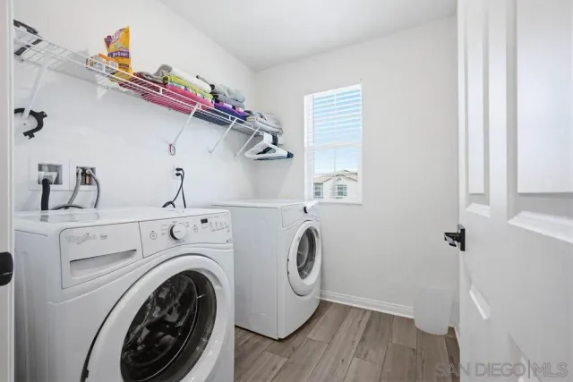 a spacious bathroom with a sink and a mirror